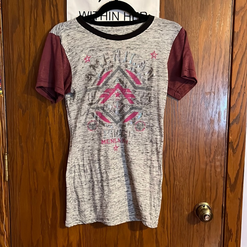 American fighter T-shirt size Large. Bought from the store Buckle
